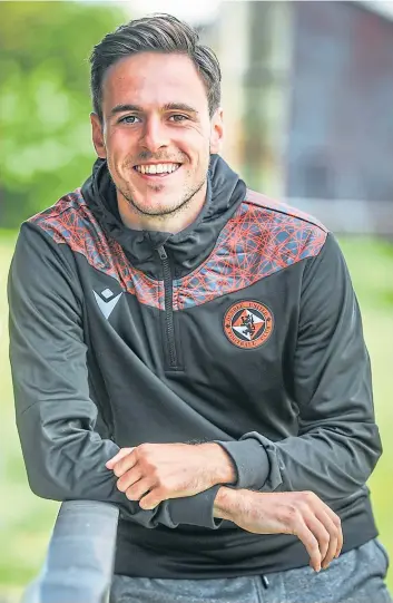  ?? Picture: Mhairi Edwards. ?? Liam Smith believes the sight of star striker Lawrence Shankland still in a Dundee United shirt is the perfect boost for the Tangerines as they head into the new Premiershi­p season. See page 50.