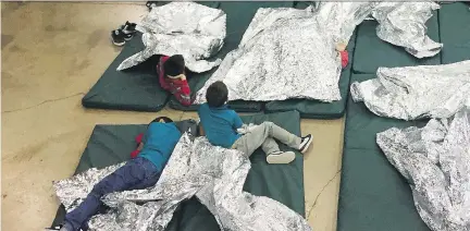  ?? THE ASSOCIATED PRESS FILES ?? The U.S. policy to separate children from their parents in immigratio­n detention has resulted in thousands of youth being warehoused in facilities like this one in Texas. Canadian refugee advocates are renewing their calls to suspend the Safe Third Country Agreement.