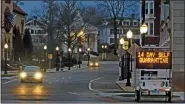  ?? HAROLD HANKA - ASSOCIATED PRESS ?? An electronic sign in downtown Westerly, R.I., informs motorists Thursday of a quarantine policy announced by Gov. Raimondo. Travelers from New York will be required to self-quarantine for 14 days upon arriving in the state.