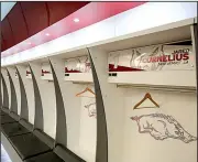  ?? NWA Democrat-Gazette/DAVID GOTTSCHALK ?? The new game-day locker room, which is shaped like a football, is estimated at 15,000 square feet. It holds approximat­ely 90 lockers and includes a training room and a coaches locker room.