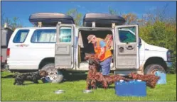  ??  ?? “I hunt turtles four months out of year. I live off the grid in Montana,” said Rucker, who gathers his group of Boykin spaniels before they hunt for box turtles.