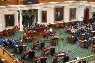  ?? Dallas Morning NEWS/TNS) ?? Senate Secretary Patsy Spaw counts the ballots after senators vote on articles of impeachmen­t during day 10 of Texas Attorney General Ken Paxton’s impeachmen­t trial in the Senate chamber at the Texas State Capitol on Sept. 16 n Austin. (Juan Figueroa/the