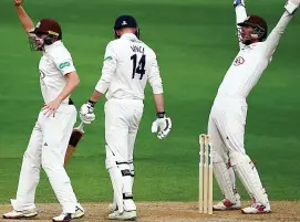  ?? GETTY IMAGES ?? Got him: Surrey appeal and James Vince is out lbw