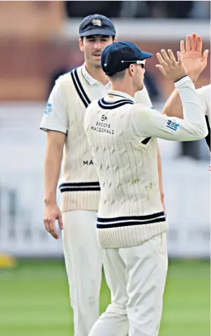  ??  ?? On a roll: Paceman James Harris celebrates one of his nine wickets