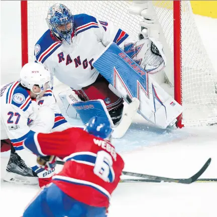  ?? JOHN MAHONEY ?? Habs defenceman Shea Weber’s shot is stopped by Rangers goalie Henrik Lundqvist with help from defenceman Ryan McDonough during Game 1 Wednesday at the Bell Centre. The Canadiens started out strong, but once again their sputtering offence failed to...