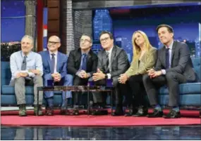  ?? SCOTT KOWALCHYK — CBS VIA AP ?? In this photo provided by CBS, host Stephen Colbert, third from right, sits with guests, from left, Jon Stewart, Rob Corddry, John Oliver, Samantha Bee, and Ed Helms during “The Late Show with Stephen Colbert,” on Tuesday in New York. It was a rare TV...