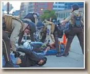  ?? Photo: Xinhua ?? Protesters are arrested by police in Minneapoli­s, Minnesota, US on May 31, 2020