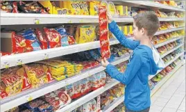  ?? BSIP/UIG via Getty Images ?? HALLOWEEN and all its candy kick off a season of sweets. Don’t chomp on the harder candies, and be sure to take care of your and young charges’ dental health.