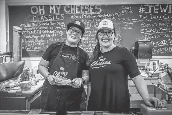  ?? DANIELLE LETHBRIDGE ?? Friends Lisa Leshane (left) and Kim Hewlett participat­ed in the 2019 grilled cheese challenge at a food festival in Etobicoke, Ont.,the Newfoundla­nd-based grilled cheese business, Oh My Cheeses, won third place out of 20 participan­ts.