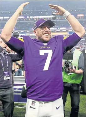  ??  ?? Vikings quarterbac­k Case Keenum celebrates a win.