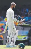  ??  ?? England's batsman Moeen Ali walks back to the pavilion.