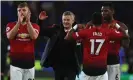  ?? Caddick/AFP/Getty Images ?? Ole Gunnar Solskjaer celebrates with his Manchester United players after the 5-1 win at Cardiff in his first game as interim manager, in December 2018. Photograph: Geoff