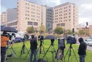  ?? PHOTO CREDIT ?? A large gathering of media personnel was camped outside Ronald Reagan UCLA Medical Center in Los Angeles where actress Carrie Fisher was reportedly taken.