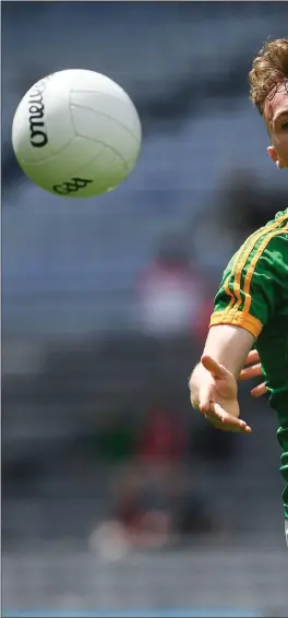  ??  ?? Louth’s David Quigley gets to grips with Meath’s Cathal McConnell during