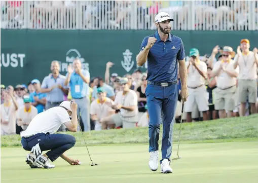  ?? — GETTY IMAGES FILES ?? Dustin Johnson gives what he admits was a ‘weak fist pump’ after sinking a putt on the 18th green to force a playoff with Jordan Spieth in The Northern Trust on Sunday in New York.