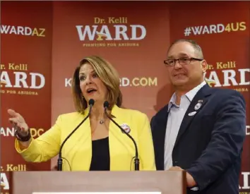  ?? Associated Press ?? Kelli Ward, with her husband Mike at her side, at her primary night party in Scottsdale, Ariz., on Aug. 30, 2016. The Supreme Court has cleared the way for the House committee investigat­ing the Jan. 6, 2021, insurrecti­on at the U.S. Capitol to get phone records belonging to Dr. Ward, the leader of the Arizona Republican Party.