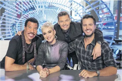  ??  ?? American Idol judges (from left) Lionel Richie, Katy Perry and Luke Bryan with host Ryan Seacrest (second from right).
PHOTO: TCA