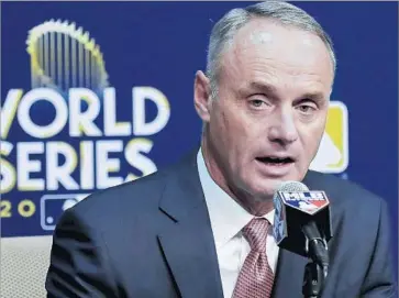  ?? David J. Phillip Associated Press ?? COMMISSION­ER Rob Manfred said it would be unfair to punish the other 24 players on the Astros roster because of Yuli Gurriel’s gesture, but there was no worry about the Dodgers after Chase Utley’s slide in 2015.