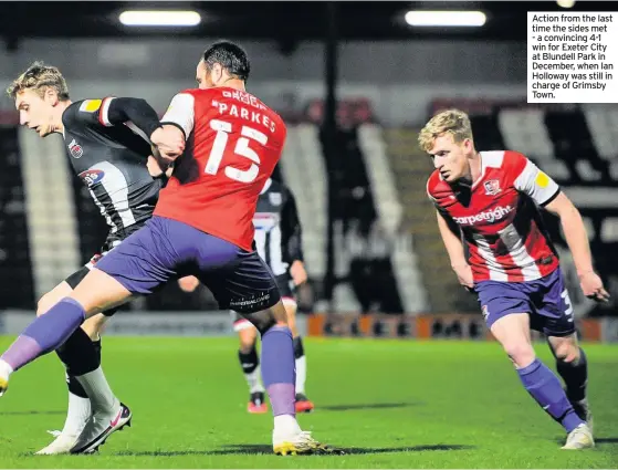  ??  ?? Action from the last time the sides met - a convincing 4-1 win for Exeter City at Blundell Park in December, when Ian Holloway was still in charge of Grimsby Town.