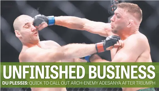  ?? Picture: Getty Images ?? ON THE BUTTON. South Africa’s Dricus du Plessis (right) lands a punch on American Sean Strickland during their UFC297 middleweig­ht title fight at the Scotiabank Arena in Toronto yesterday.