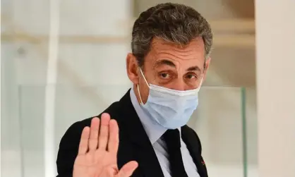  ?? Photograph: Martin Bureau/AFP/Getty Images ?? Nicolas Sarkozy, 65, is France’s first modern head of state to appear in the dock.