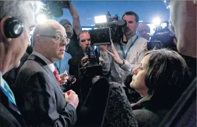  ?? CP FILE PHOTO ?? Dr. John Haggie speaks to the media outside the meeting of The Council of the Federation in Victoria on January 17, 2012.