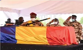  ??  ?? Chad army officers pay tribute to the late President Idriss Déby. Photograph: Issouf Sanogo/AFP/Getty