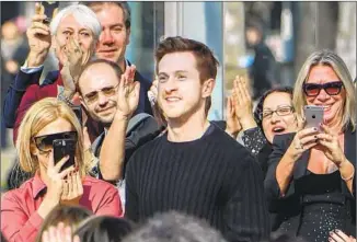  ?? ANDREAS SOLARO AFP ?? PHOEBE PHILO, left, curated a design team at Celine that included Lee, right, and others now in demand for that experience.