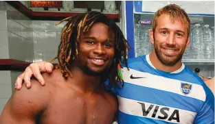  ??  ?? Happier times: Marland Yarde and Chris Robshaw after an Argentina Test