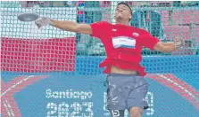  ?? AP ?? Panamerica­nos. El chileno Santiago Ford compite en la prueba de disco del decatlón de los Juegos de Santiago./