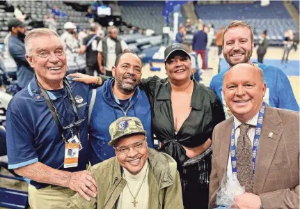  ?? COURTESY OF LAVELT HILL ?? Lavelt Hill (2nd from left) with, from left to right, usher Joe Newman; season ticket holder Adrian Shavers; Cynthia Johnson, mother of former Grizzlies player Jevon Carter; and Grizzlies TV announcer Pete Pranica.
