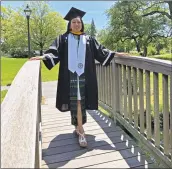  ?? Contribute­d photo ?? Stamford resident Katherine Uchupailla poses in her cap and gown at Binney Park in Greenwich while celebratin­g her graduation from Providence College in May.