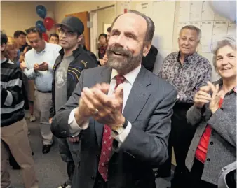  ?? Photos by Mathew Sumner / Special to The Chronicle ?? Assemblyma­n Jerry Hill applauds early election returns, which showed him with a sizable lead.