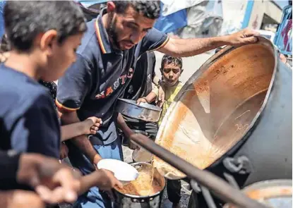  ?? / ANADOLIJA ?? Palestinci se suočavaju s nestašicom hrane zbog izraelskih napada i opsade