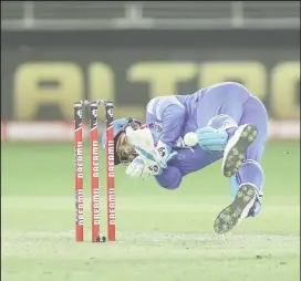  ??  ?? Rishabh Pant of Delhi Capitals attempts a run out during the IPL match between the Kings XI Punjab and the Delhi Capitals at the Dubai Internatio­nal Cricket Stadium, Dubai, United Arab Emirates yesterday. Photo by: Ron Gaunt / Sportzpics for BCCI