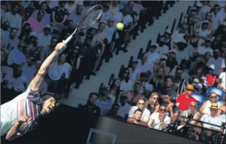  ?? REUTERS ?? ■
Germany's Alexander Zverev serves during his match in the Australian Open quarter-final against Switzerlan­d's Stan Wawrinka at Melbourne Park on Wednesday.