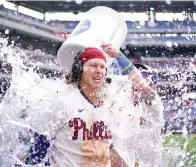  ?? (AP photo/matt Slocum) ?? Philadelph­ia Phillies’ Alec Bohm is doused after he hit a game-winning Rbi-single against Arizona Diamondbac­ks relief pitcher Jose Ruiz Wednesday during the tenth inning of a baseball game in Philadelph­ia.