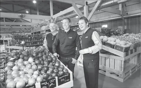  ?? MARIE-FRAN CE COALLIER THE GAZETTE ?? André Dion (left) and his son Sébastien (right), owners of Ferme Guyon, with their business partner, celebrity chef Ricardo, look forward to another season for Ferme Guyon, located in Chambly, east of Montreal. Ricardo owns 20 per cent of the business.