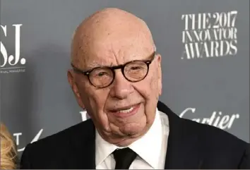  ?? Evan Agostini/Invision/AP photos ?? Rupert Murdoch is stepping down as chairman of News Corp. and Fox Corp., the companies that he built into forces over the last 50 years. He will become chairman emeritus of both corporatio­ns, the company announced Thursday. His son, Lachlan, will control both companies.