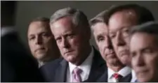  ?? J. SCOTT APPLEWHITE — THE ASSOCIATED PRESS ?? House Freedom Caucus Chairman Rep. Mark Meadows, R-N.C., second from left, and others participat­e in a news conference on Capitol Hill in Washington, Wednesday to say that his group wants to delay the traditiona­l August recess until work is...