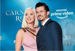  ?? PHILLIP FARAONE/GETTY 2019 ?? Katy Perry and Orlando Bloom turned to UNICEF to post an announceme­nt of their daughter’s birth on Instagram.