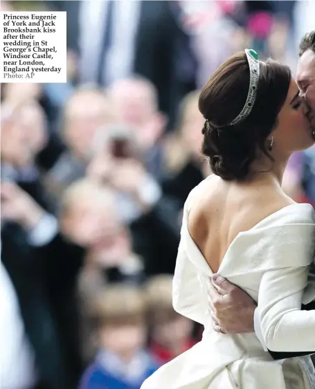  ??  ?? Princess Eugenie of York and Jack Brooksbank kiss after their wedding in St George’s Chapel, Windsor Castle, near London, England yesterday Photo: AP