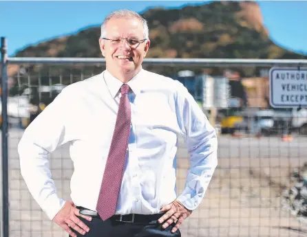  ?? COMMITMENT: Treasurer Scott Morrison in Townsville yesterday outside the new stadium constructi­on site. Picture: ALIX SWEENEY ??