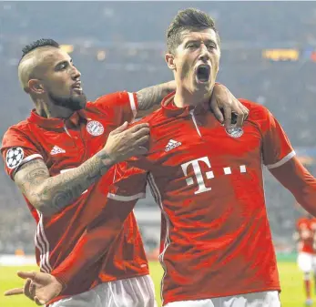  ?? FOTO: IMAGO ?? Säulen des Kantersieg­s: Robert Lewandowsk­i (rechts) und Arturo Vidal.