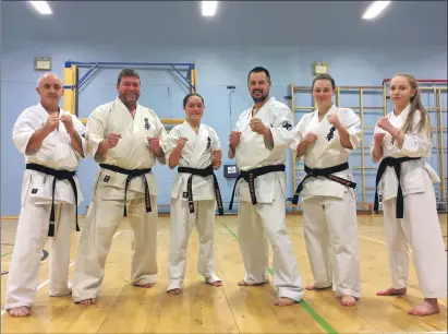 ??  ?? Iain Rodger with some of his blackbelts from Argyll. L-R: Wallace Simpson, Iain Rodger, Chloe MacDonald, Stuart MacDonald, Katie MacDonald and Jodie Robertson.