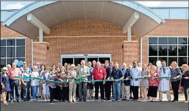  ?? (Photo courtesy of Jacob McGill) ?? Walk-in health center, Hamilton Physician Group-Catoosa, celebrated with a grand opening and ribboncutt­ing on June 12.