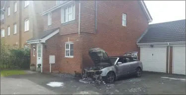  ??  ?? A mum and baby escaped from their home after a car caught fire on the driveway
