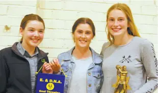  ??  ?? Mia McGarrity and Lily Kennedy of Ellinbank won the D grade goal throw award, while Jasmine Ferguson took out the D grade best and fairest