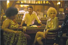  ?? PAUL SCHIRALDI - HBO ?? From left, Pernell Walker, James Franco and Maggie Gyllenhaal revisit the rise of the pornograph­y industry in the HBO drama “The Deuce,” premiering Sunday.