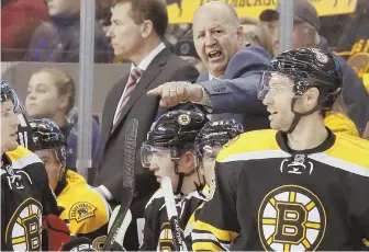  ?? HeralD PHoTo by Mary ScHwalM ?? WON’T BACK DOWN: Bruins coach Claude Julien, whose team is 0-2-1 in its past three games, made it clear yesterday he is not concerned about rumors of him losing his job and that he’s solely focused on reaching the playoffs.